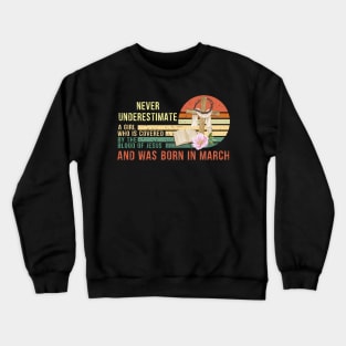 Never Underestimate a Girl Who is covered By the Blood of Jesus and was born in March Gift Crewneck Sweatshirt